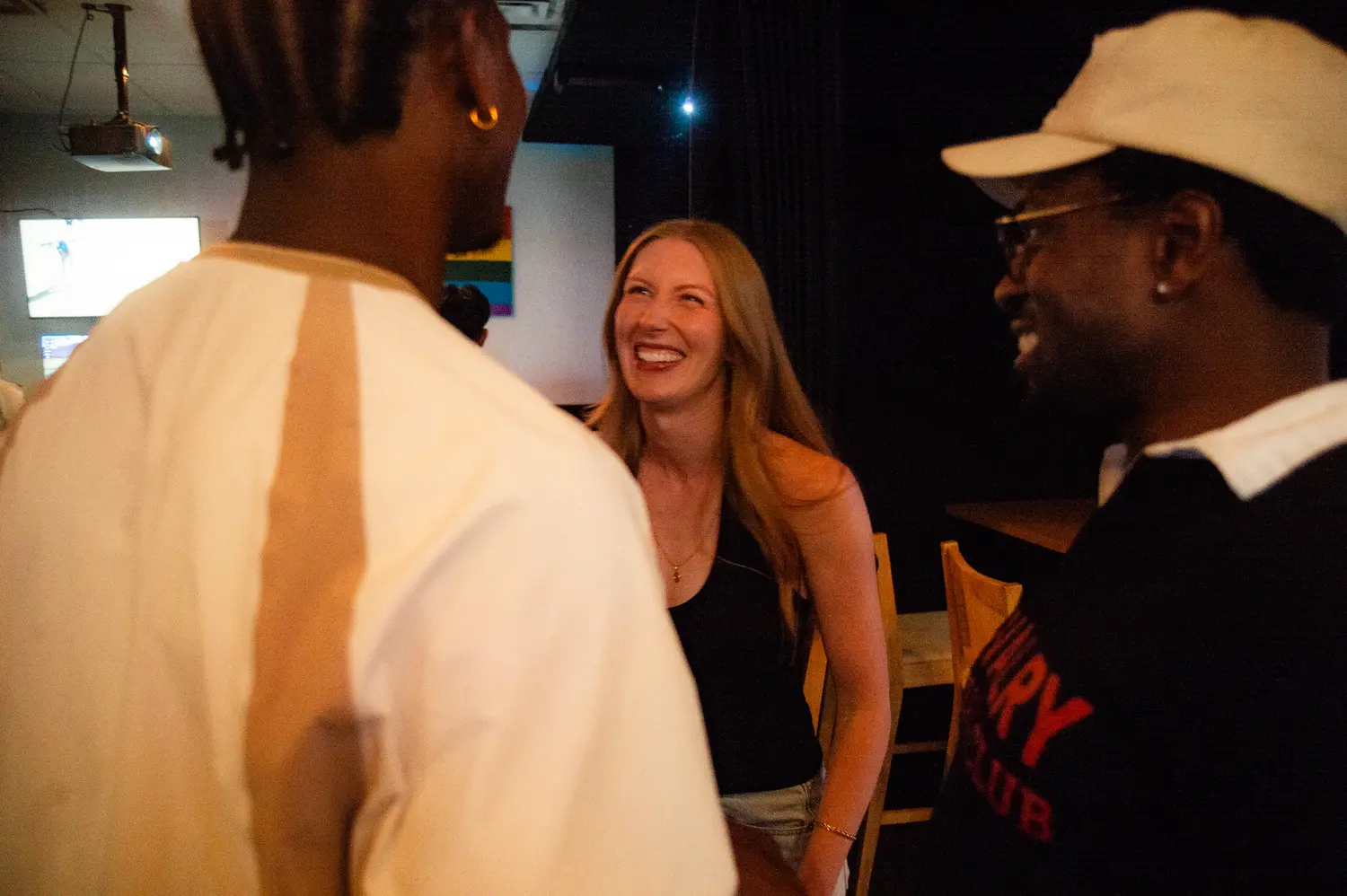 Guests laughing and connecting at Fairways & Friends